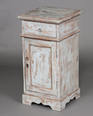 A blue painted hardwood bedside cabinet fitted a drawer above cupboard, raised on a platform base 79cm high x 42cm w x 42cm d 