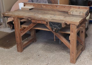 A pine work bench fitted 2 vices 92cm h x 160cm w x 64cm d 