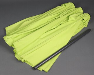 A garden triple green umbrella  