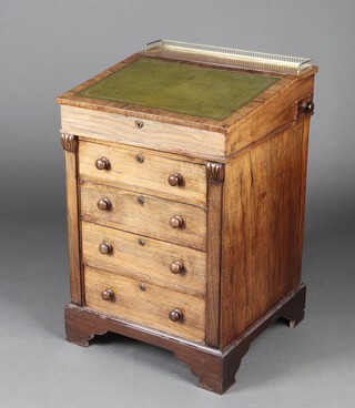 A William IV rosewood pedestal Davenport with pierced brass 3/4 gallery, green leather writing surface and inkwell drawer, the base fitted 4 drawers on bracket feet 83cm h x 63cm w x 53cm d 