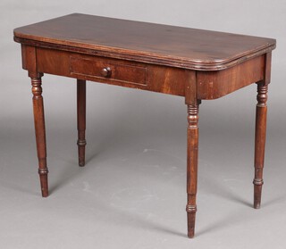 A 19th Century mahogany D shaped card table fitted a drawer, raised on turned supports 75cm high x  107cm w x 50cm d  