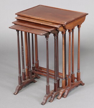 A rectangular Edwardian nest of 4 coffee tables, raised on turned supports 73cm h x 56cm w x 38cm d 