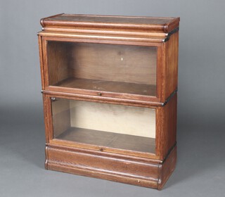 A Globe Wernicke oak 2 tier bookcase 106cm h x 66cm w x 35cm d  