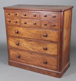 A Victorian mahogany D shaped chest fitted 1 long drawer, flanked by 4 short drawers, above 3 long drawers, with turned handles 119cm h x 120cm w x 55cm d 
