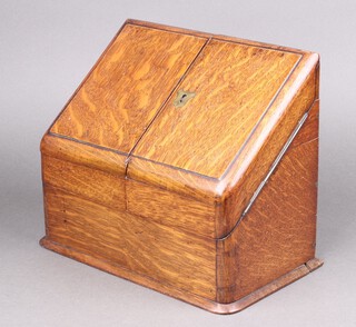 A Victorian wedge shaped stationery box with stepped interior with brass escutcheon 24cm h x 28cm w x 16cm d 