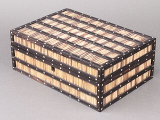 A rectangular Indian ebony and porcupine quill box, fitted a tray with 9 compartments, 10cm h x 27cm w x 19cm d 