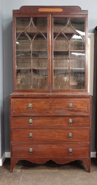 A Georgian mahogany secretaire bookcase with moulded cornice, fitted adjustable shelves enclosed by astragal glazed panelled doors, base fitted a secretaire drawer above 3 long drawers, raised on bracket feet 225cm h x 106cm w x  50cm d 