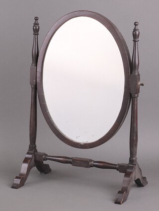 A 19th Century oval plated dressing table mirror contained in a mahogany swing frame 49cm h x 31cm w x 21cm d 