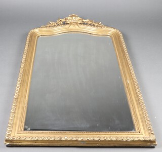 A 19th Century French arched plate mirror contained in a gilt painted plaster frame 154cm h x 83cm w