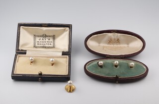 Three 18ct gold and pearl dress studs in Jay's of Brighton box, together with 3 gilt metal and pearl dress studs cased 