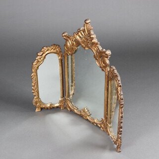 An Italian style triple plate dressing table mirror, contained in a carved gilt frame 70cm h x 80cm w 