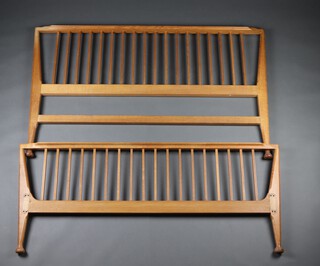 A stylish mid-century Heals light oak slatted oak bed stead 158cm h, head board 100cm h x 163cm w, foot board 68cm h, complete with iron rails and large casters (not photographed) 