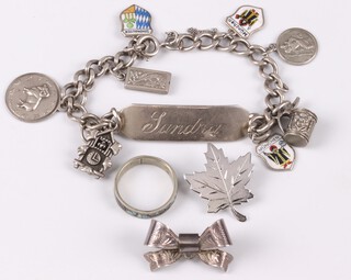 A silver curb link identity bracelet marked Sandra, hung charms 20cm,  an "abalone" ring and 2 brooches 
