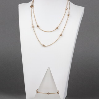 A 9ct gold multi link chain with interspersed ball decoration 74cm, together with a matching bracelet 17.5cm, 11g 