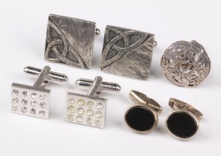 A pair of marked silver oval black enamelled cufflinks, 2 pairs of cufflinks and a pierced silver cufflink 