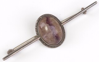 An oval cabochon "blue john" bar brooch 