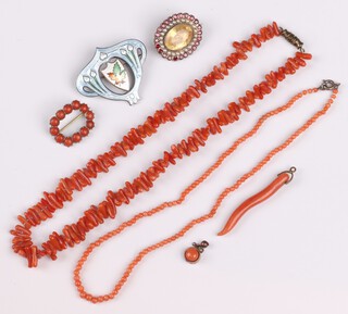 An oval coral and gilt mounted brooch 2cm, an oval twig pendant, 2 coral necklaces, an enamelled brooch and a pearl and paste set brooch 