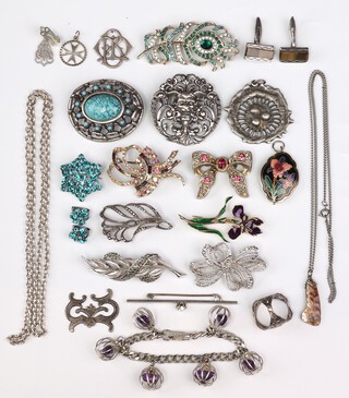 A pair of rectangular silver cufflinks set hardstones and a collection of decorative brooches 