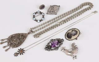 A Mexican engraved silver brooch in the form of a cockerel, an Eastern belcher link chain hung a pierced charm and other items of costume jewellery 