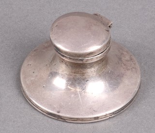 A silver capstan inkwell Birmingham 1921 5cm x 7cm, marks rubbed 