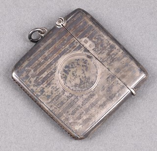 A silver vesta case with engine turned decoration Birmingham 1912 by Cornelius Desormeaux and Saunders and James Francis Hollings, 29g 