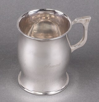 A silver christening tankard of baluster form, engraved Jemma, Sheffield 1915, marks rubbed, 116g 