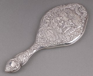 An embossed silver backed hand mirror Birmingham 1912 by Levi Salman 