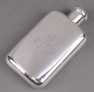 A Victorian silver hip flask with armorial and patented cap top, marked Registered June 29th 1881, by Wright and Davies, marks rubbed, 145g 