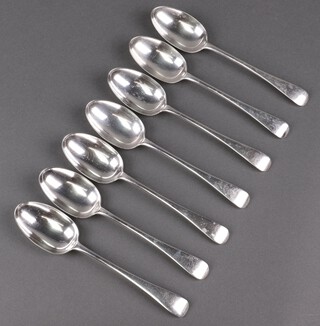 Seven Edwardian silver Old English pattern table spoons, London 1900 by John Williams & Co., 515g 