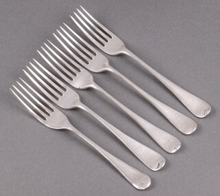 Five various silver Old English pattern pudding spoons 244g 