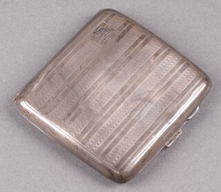 A silver cigarette case with engine turned decoration, monogrammed Birmingham 1926, 87g 