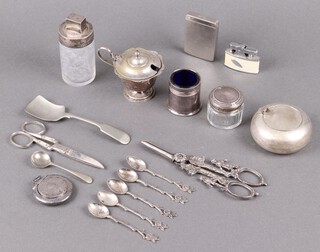 A engraved miniature silver powder compact with mirror, Birmingham 1944, 13g gross, a cut glass dressing table jar with silver collar 8cm (lid stuck), 1 other with silver lid 4cm and a collection of plated items