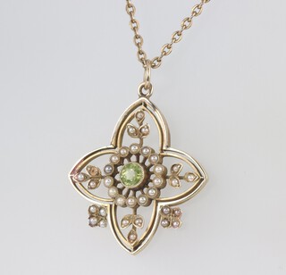 A yellow metal pearl and peridot set pendant 3cm, hung on a yellow metal chain 45cm 