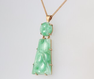 A green hardstone pendant with 9ct gold mounts 4.5cm, hung on a 9ct gold chain 40cm