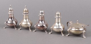A Georgian style 5 piece matched condiment set comprising mustard pot, 2 peppers London 1963 and  2 salt pots London 1964, by Harrods, together with an associated spoon, 345g 