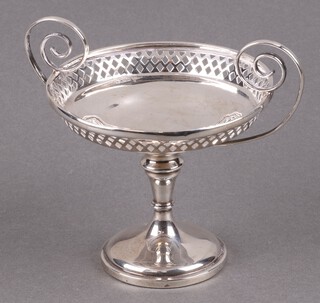 A circular pierced silver twin handle bowl on a spreading foot Sheffield 1912 by Walker & Hall, 115g 