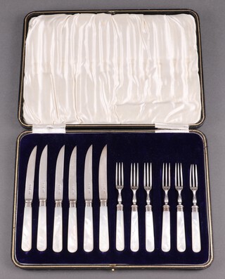A set of 6 silver bladed fruit knives and forks with mother of pearl handles, cased, Sheffield 1909 by James Dixon & Son 