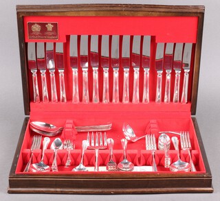Arthur Price, a 74 piece canteen of silver plated flatware comprising soup ladle, 4 serving spoons, 8 dinner knives, 12 dinner forks, 8 soup spoons, 8 tea knives, 4 pudding forks, 8 pudding spoons, 6 cake forks, 8 tea spoons, 6 grapefruit spoons, all contained in a mahogany canteen box 
