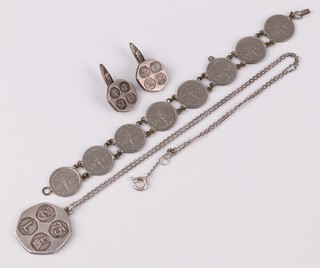 A pair of silver cufflinks, a silver charm in the form of a 50 pence piece, together with a coin bracelet 