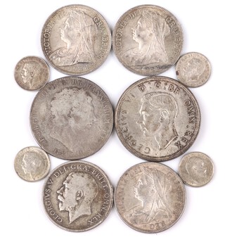 A Georgian 1820 crown, a George VI 1937 crown, 3 Victoria 1897 half crowns, an 1899 ditto, George V ditto 1917 and 3 Maundy threepence (11)