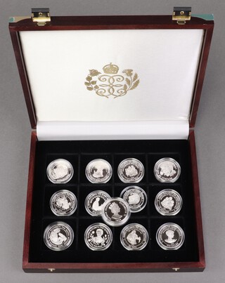 Thirteen Royal Mint Queen Elizabeth The Queen Mother Lady of The Century silver crowns, 364g 