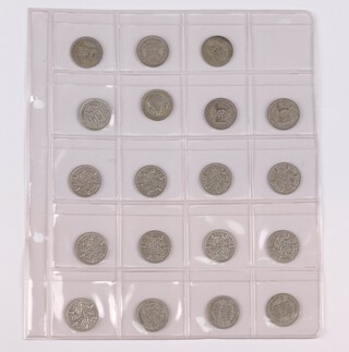 A quantity of various silver sixpences