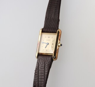 A lady's Cartier Tank, Must de Cartier wristwatch, the case marked Cartier Paris 925 366001 17476, boxed, with certificate dated 9. 24. 90 