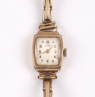 A lady's Rotary wristwatch with oval dial, gilt Arabic numerals, movement marked 790 15 jewels, contained in a 9ct gold case on a gilt metal strap 