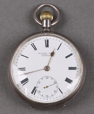 Of Horsham interest, an open faced key wind pocket watch with enamelled dial marked Herbert Baker Queen Street Horsham, with subsidiary second hand and Roman numerals, contained in a silver case Birmingham 1903, the dust cover marked H Taylor 
