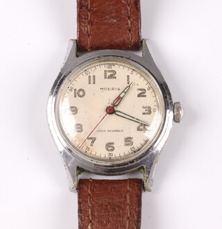 A Moeris wristwatch with white dial and Arabic numerals, movement signed Moeris 17 jewels 10 1/2, contained in a stainless steel 