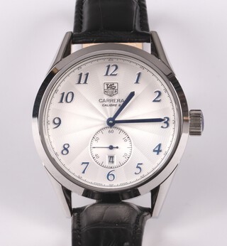 A gentleman's Tag Heuer Carrera Heritage Calibre 6 automatic wristwatch with silvered dial, Arabic numerals and subsidiary second hand, contained in a steel case, on a leather strap, boxed, complete with International Guarantee 