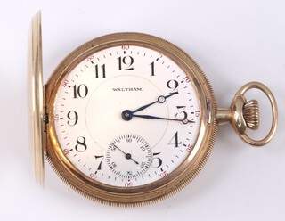 A Waltham full hunter pocket watch with enamelled dial, Arabic numerals and subsidiary second hand  contained in a gold plated case, movement signed A.W.CO. Waltham Mass Riverside, inside of front dust cover engraved "First Prize to Harris Harvey ...1920 ...  Canadian Metal Company Ltd." , contained in a wooden case 