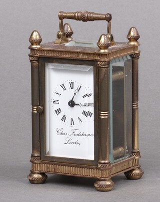 Charles Frodsham, a miniature carriage timepiece with 3 cm enamelled dial, Roman numerals, contained in a gilt metal case supported by pillars, both back and front door open 9cm h x 5.5cm w x 5cm d 