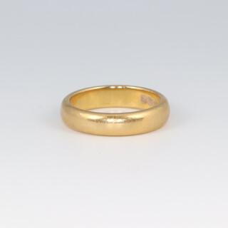 A 22ct gold wedding band, size K 1/2, 6.4g